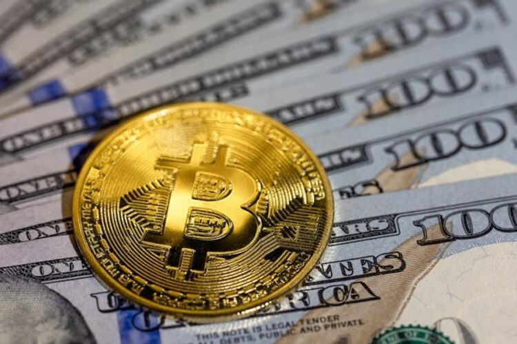 Bitcoin coin with dollar bill concept finance background closeup 169016 60937.jpg