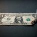 00 cover burning dollar scaled 1.jpg
