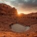 Lucid origin photograph of an empty terracotta toned amphitheatre of eroded rock warm clay an 0.jpg